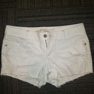 White distressed denim shorts
